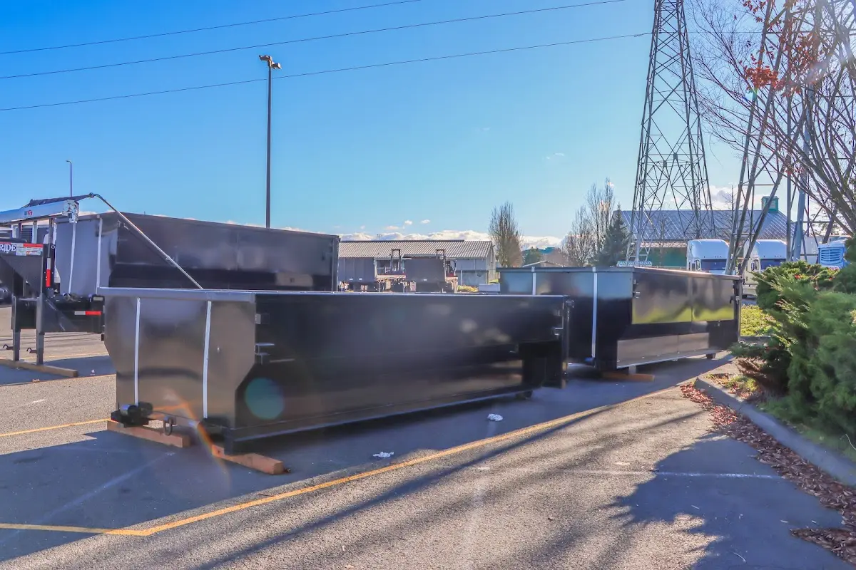 Roll-off dumpster ready for waste disposal at job site for Concrete Dumpster Rental in Perrysburg